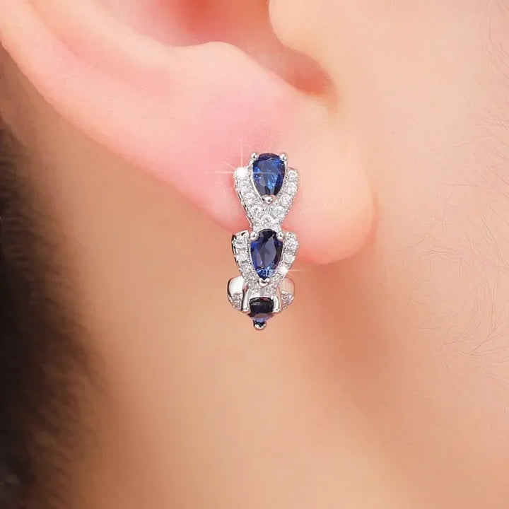 Royal Sapphire Crest Earrings | White Gold
