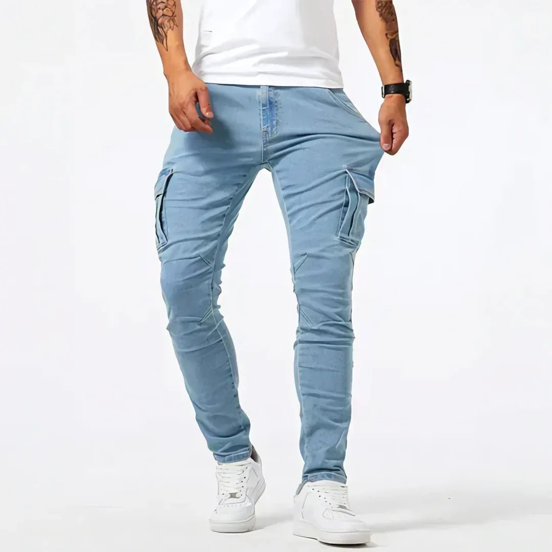 Brent men's slim cargo jeans in blue, shown on a model